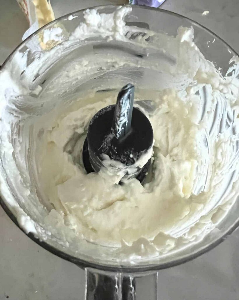 Blended cottage cheese in a blender. 