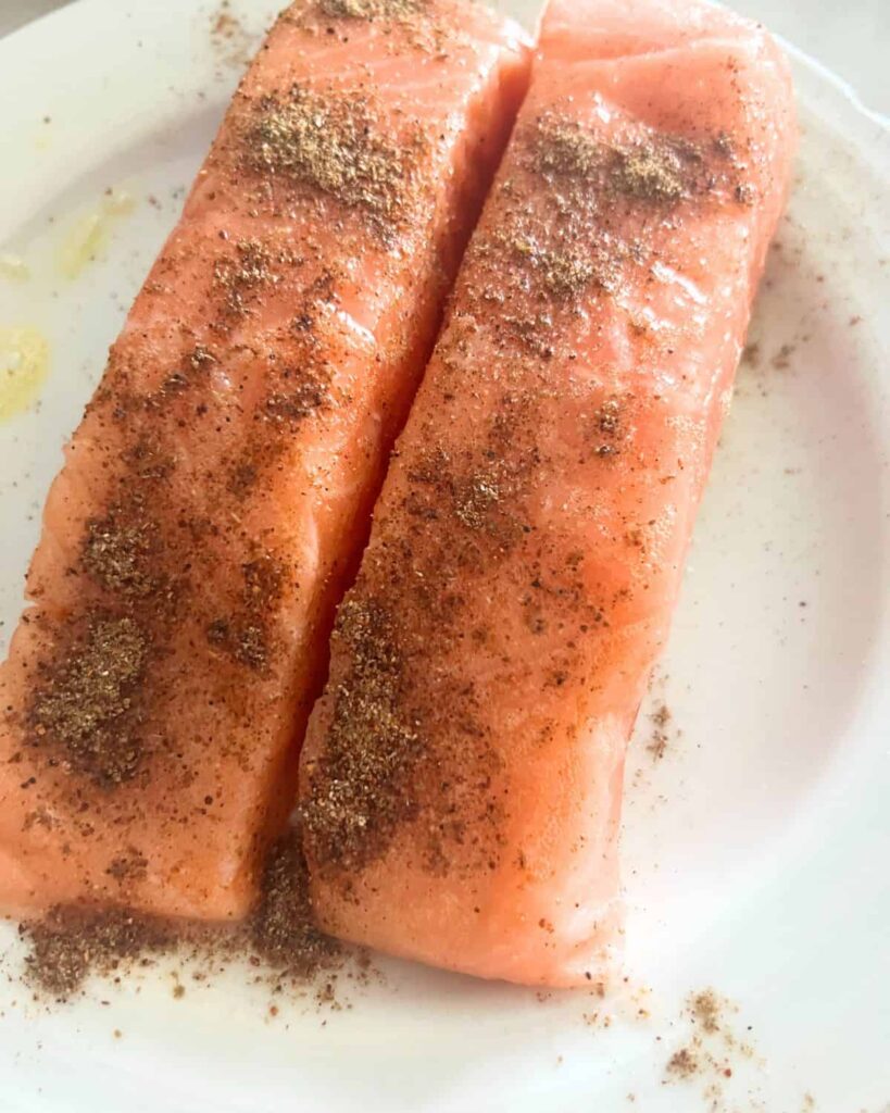 Seasoned salmon sprayed with cooking spray. 