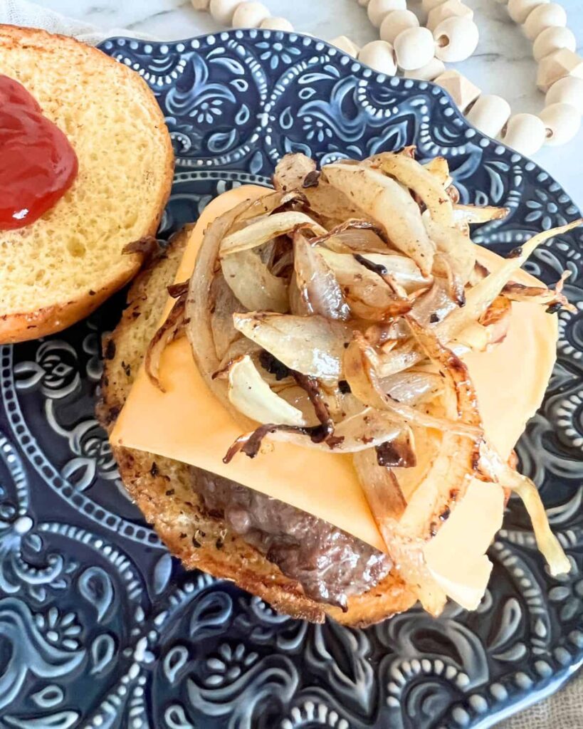 Smashed Cheeseburgers with Caramelized Onions